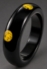 vintage black bakelite bangle with 6 marbled pale yellow up and down dots